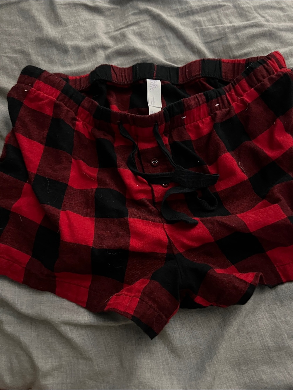 stars above Red and Black Buffalo Plaid Women’s Shorts